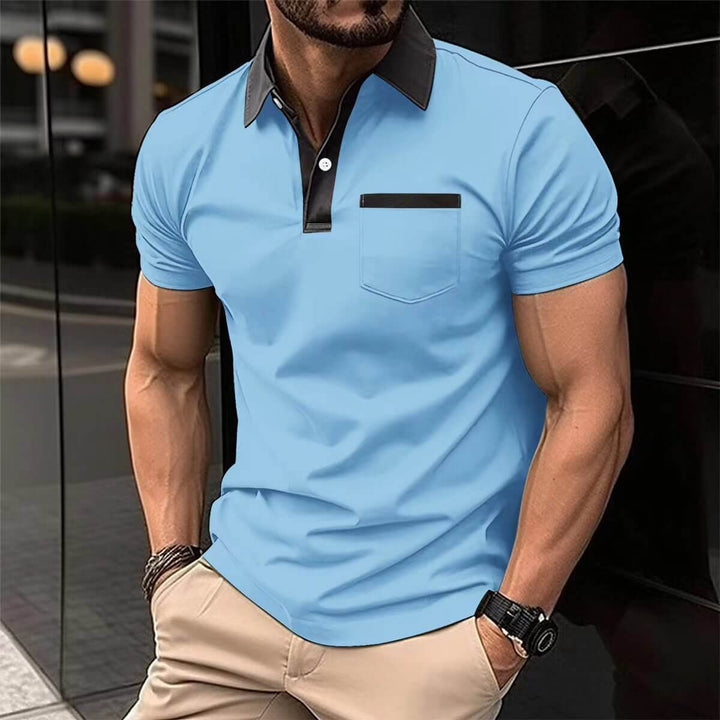 Men's short-sleeved polo shirt in light blue with black collar and pocket, perfect for casual and semi-formal wear.