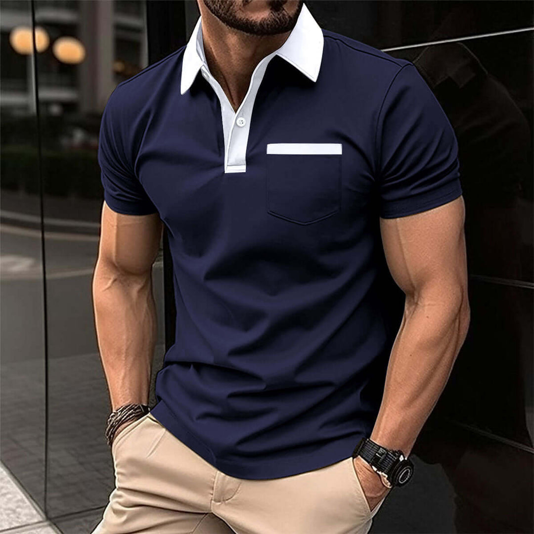 Men's short-sleeved polo shirt in navy blue with white collar, showcasing a stylish and fitted look.