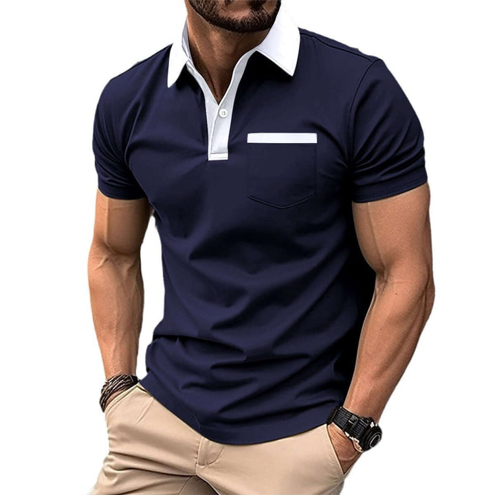 Men's short-sleeved navy polo shirt with classic collar and pocket, perfect for casual or semi-formal wear.
