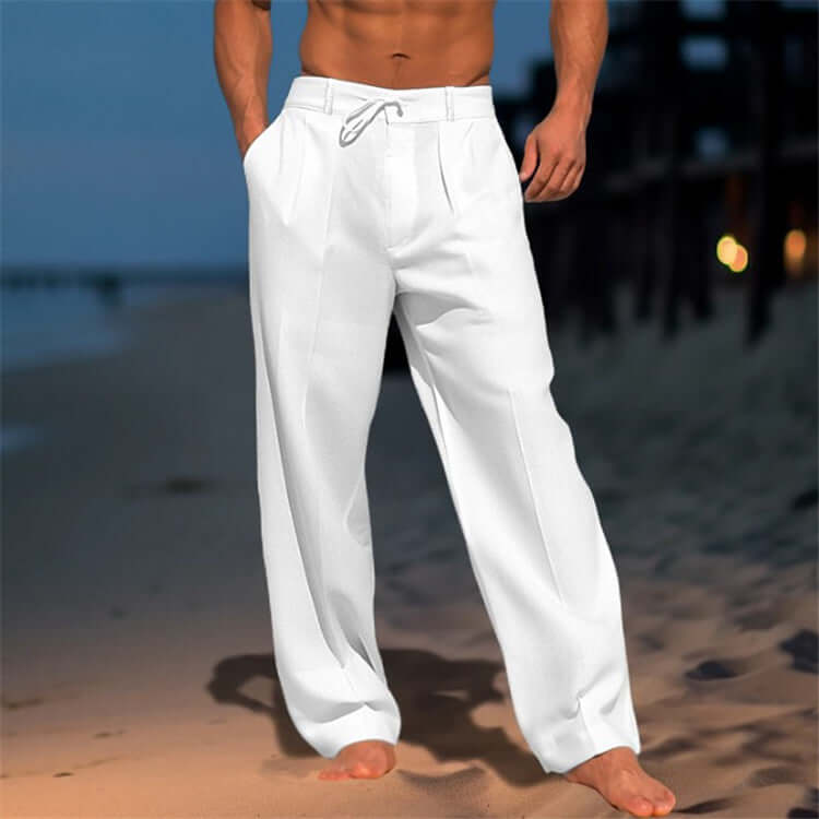 Men's wide-leg drawstring pants in white, perfect for casual beach style and comfort on warm days.