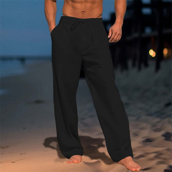 Men's wide-leg drawstring pants in black, perfect for beachwear and casual outings.