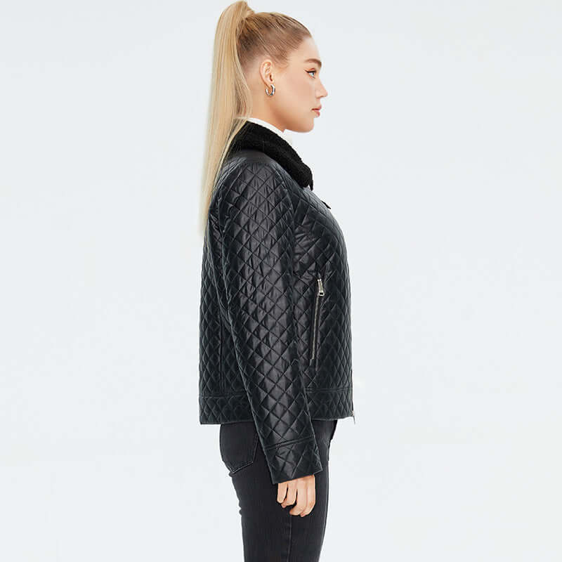 Profile view of women's quilted casual jacket featuring a stylish black quilted design and a cozy collar.