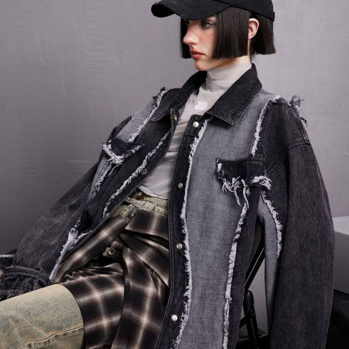 Model wearing a stylish men's denim jacket with stitching details, showcasing a modern, rugged look.
