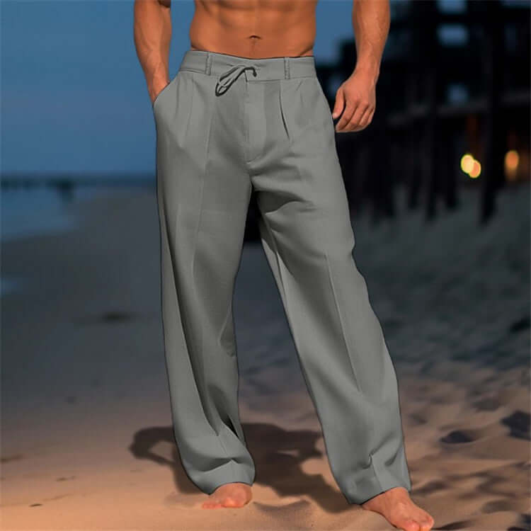 Wide-leg drawstring pants for men in gray, ideal for comfort, style, and versatile wear on the beach.