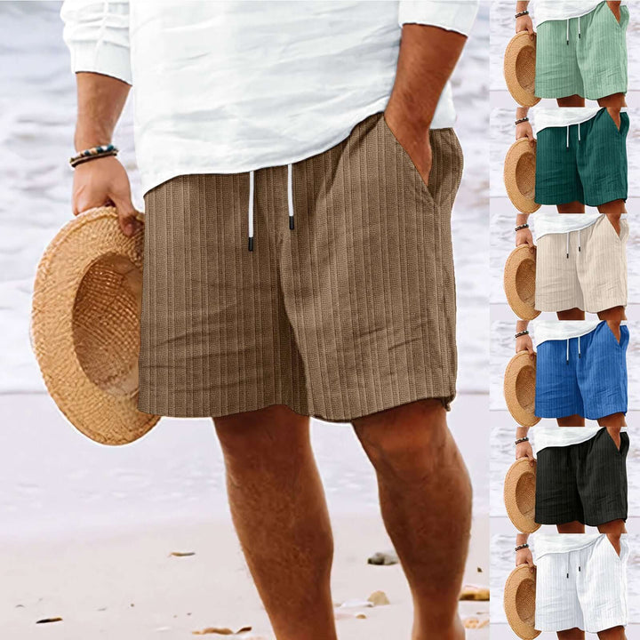 Men's summer fashion drawstring shorts in various colors, shown at the beach, perfect for warm-weather activities.