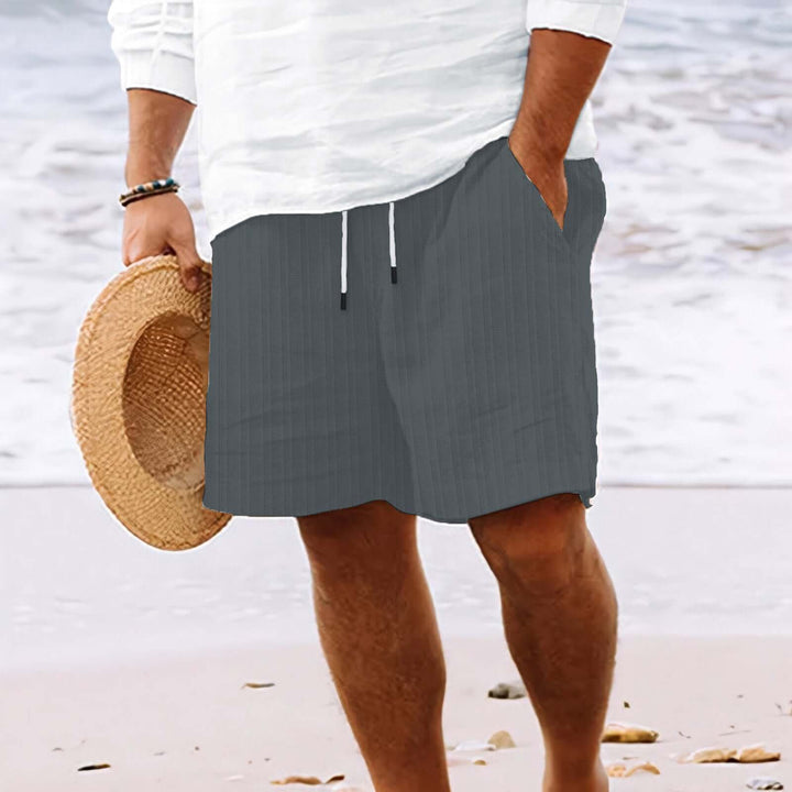 Stylish summer fashion drawstring shorts with pockets, perfect for beach days and warm-weather outings.