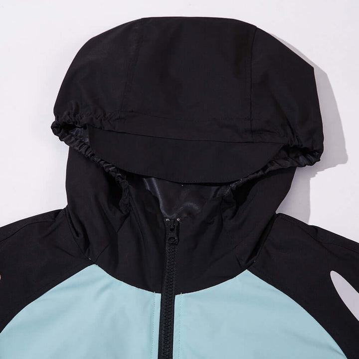 Close-up of the adjustable hood of a lightweight sun-protective wind coat for men.