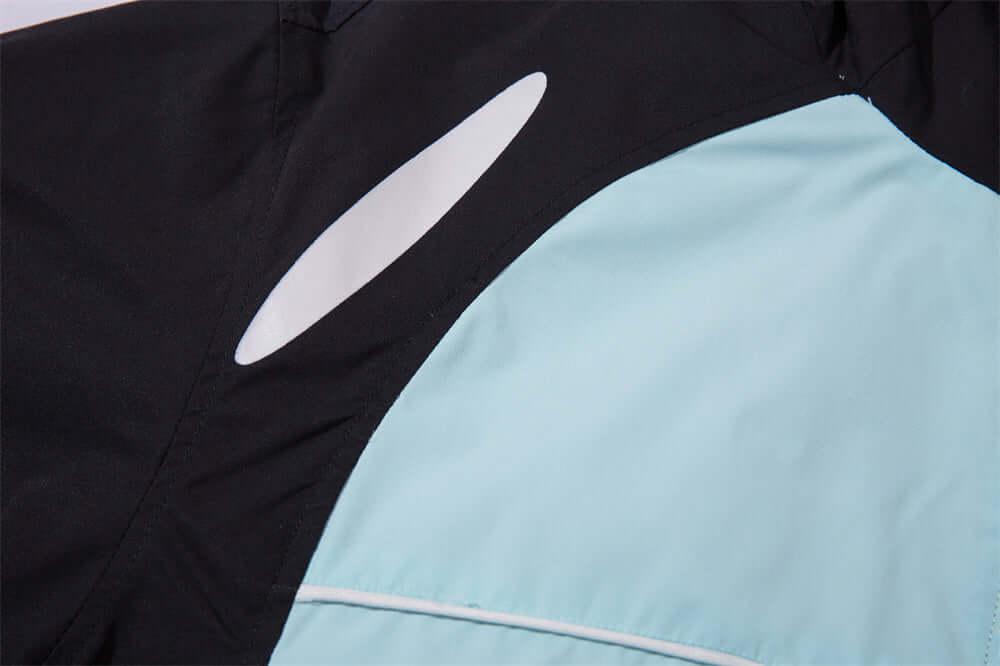 Detail of sun-protective wind coat for men featuring lightweight fabric and breathable design.