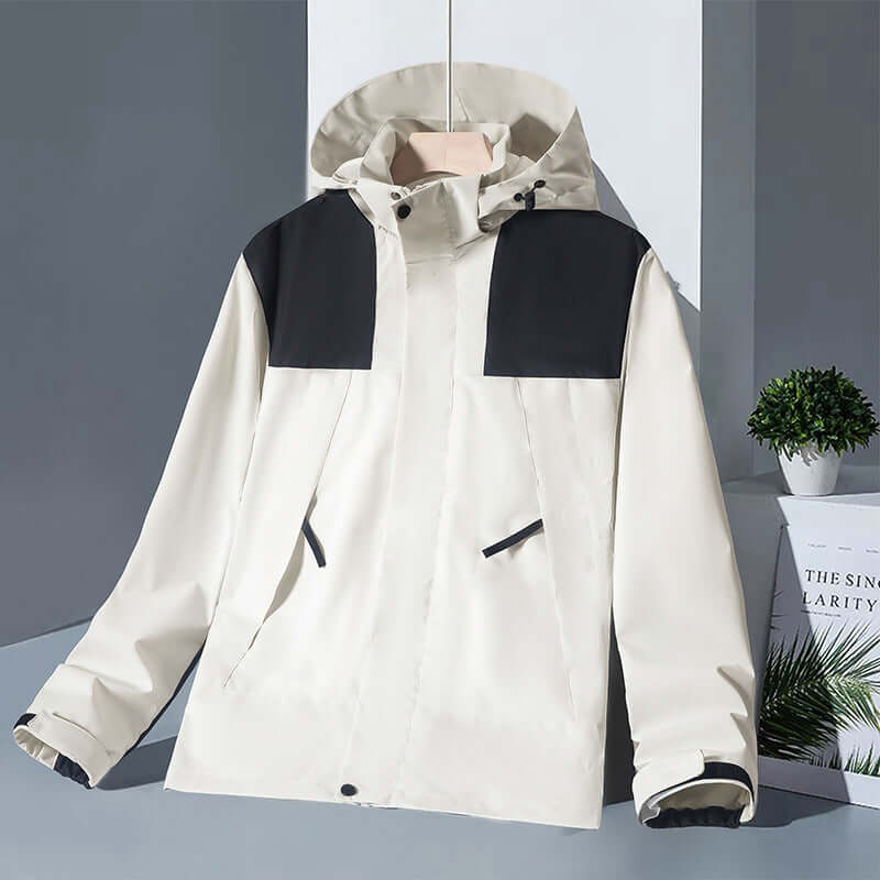 Waterproof colorblock windbreaker jacket in cream and black, perfect for outdoor activities and urban wear.
