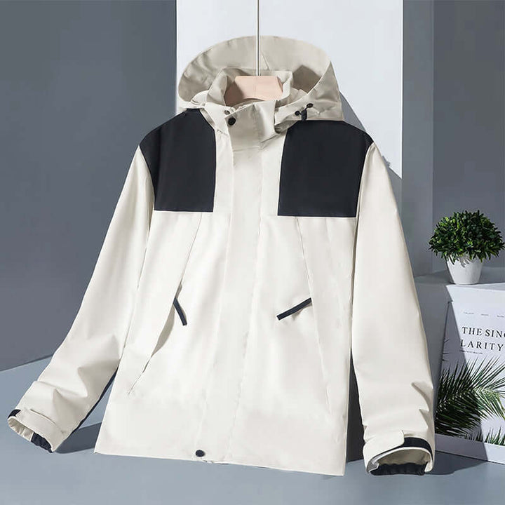 Waterproof colorblock windbreaker jacket in cream and black, perfect for outdoor activities and urban wear.