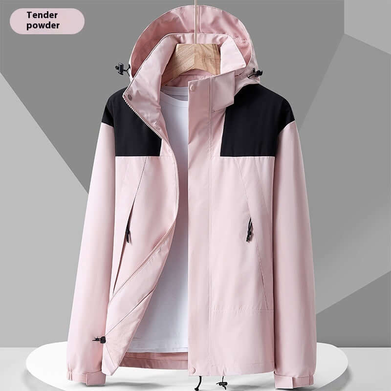 Waterproof colorblock windbreaker jacket in tender powder pink and black, perfect for outdoor activities.