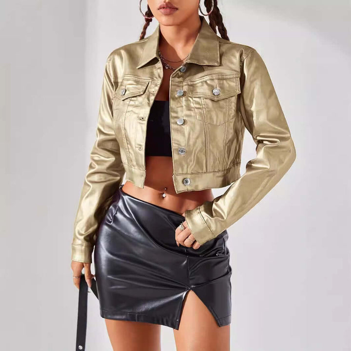 Women in a stylish street style coated jacket paired with a black mini skirt, showcasing modern urban fashion.