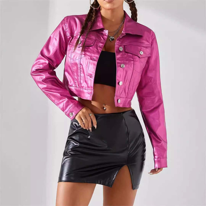 Women's pink coated street style jacket paired with a black leather skirt, showcasing modern urban fashion.